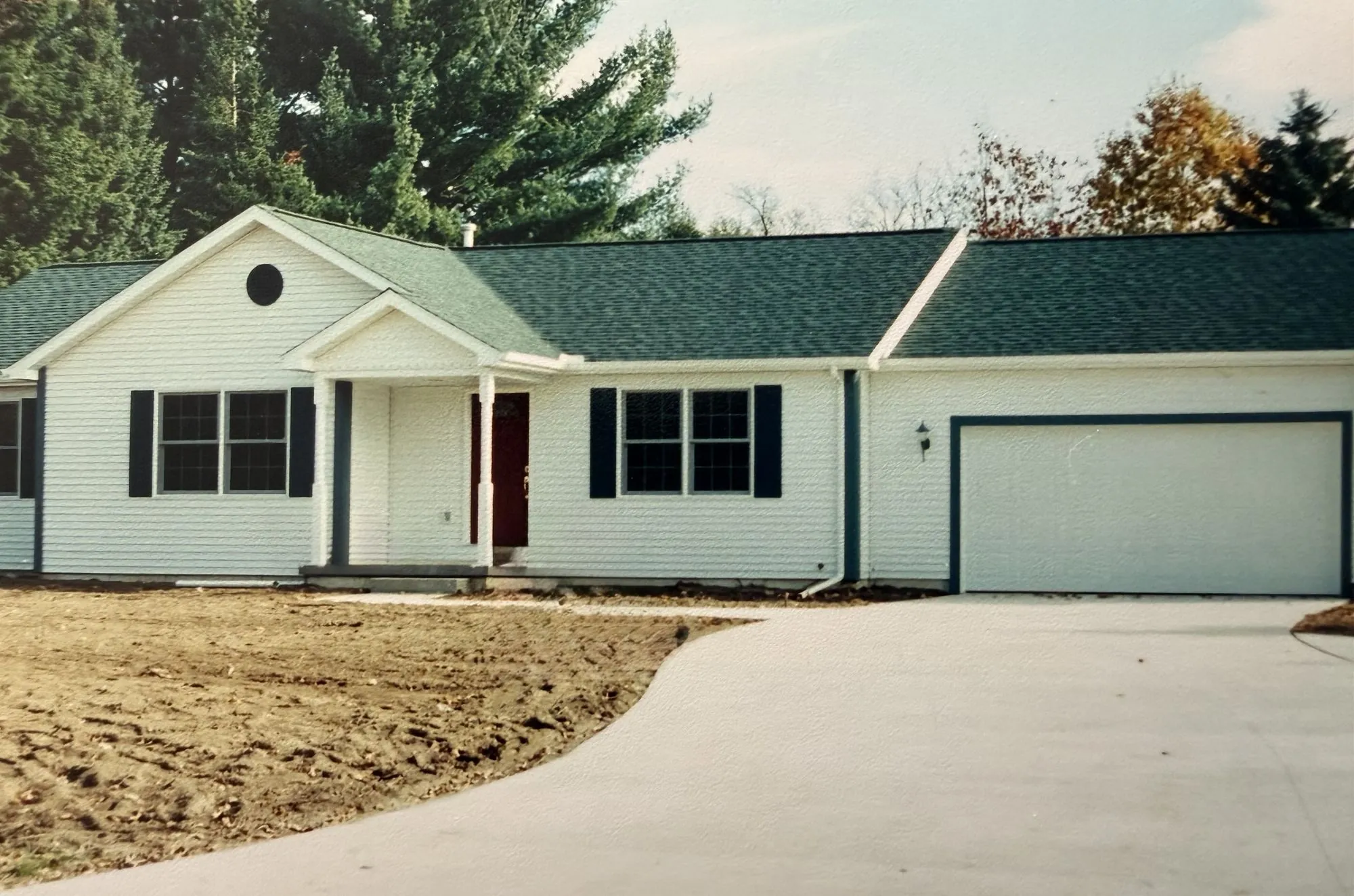 A newly finished white ranch, built by the Strouss family